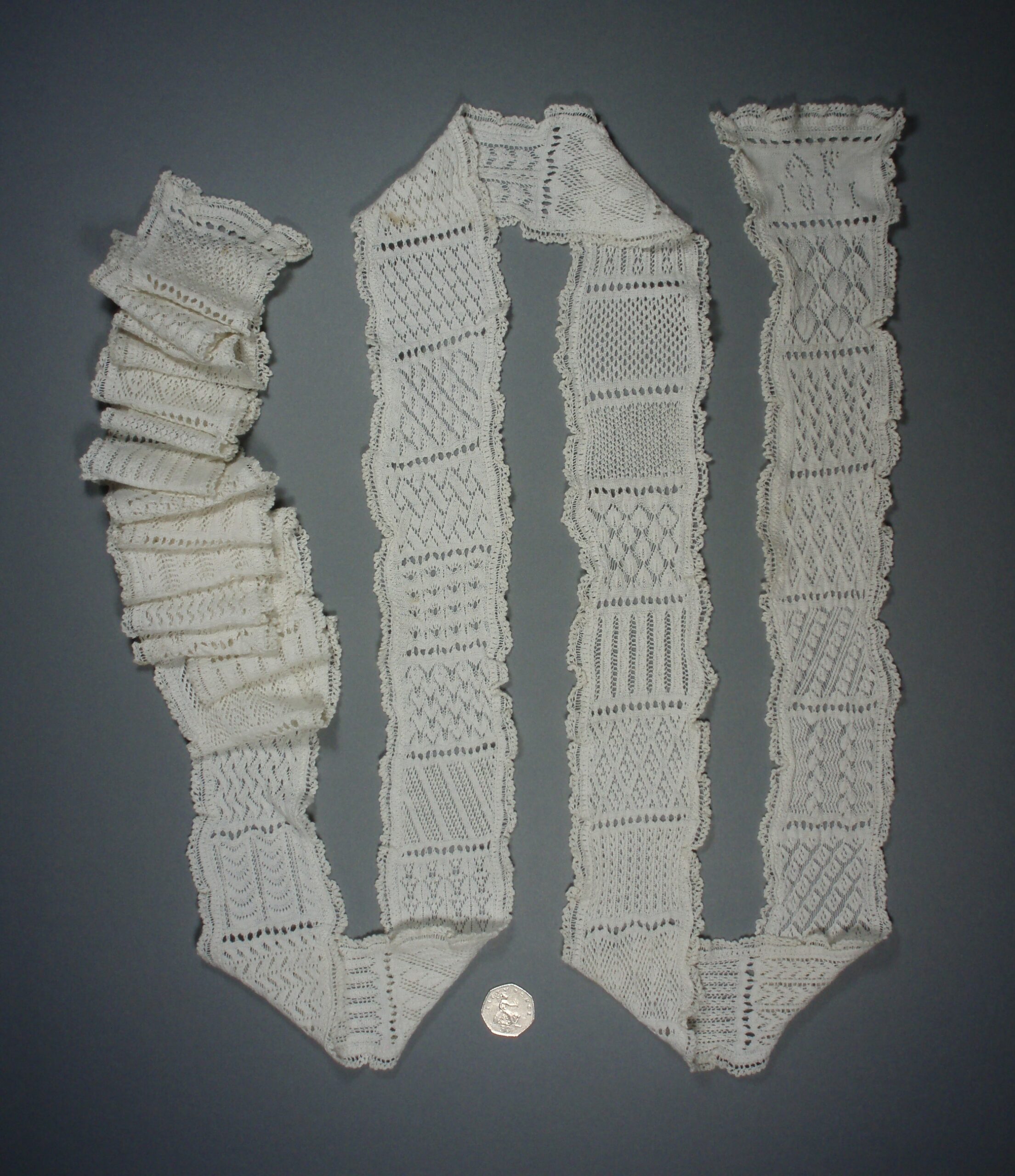 Knitted sampler from 1891 showing many openwork stitch patterns