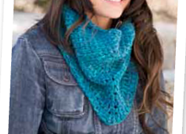 Photograph of a Tunisian crochet bandana in turquoise.